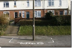 a-council-paint-a-disabled-parking-area-around-a-lampost-pic-dm-574023350