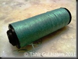 3. Spindle with cotton thread