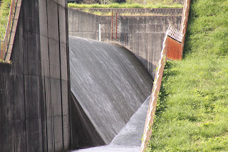 View of the flood discharge from the bridge downstream