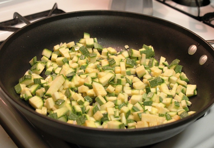 sauteed zucchini in a pan 