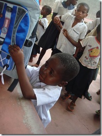 Child receiving backpack sm