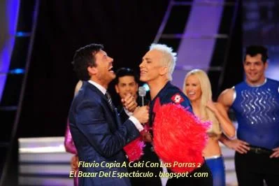 Flavio Copia A Coki Con Las Porras 2.jpg