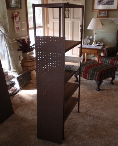 metal shelf with pegboard