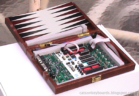 The new STK-500 case with one of the backgammon board pieces that was originally in it.