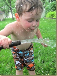 Aidyn drinking from hose