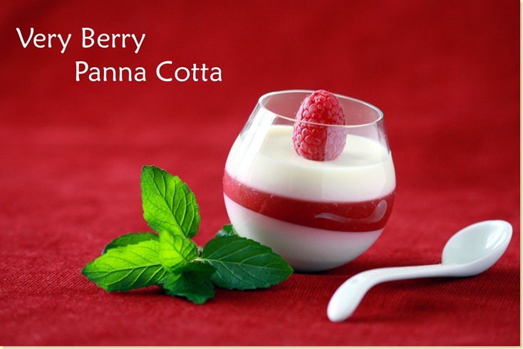 Panna cotta in a glass cup with mint and a spoon.