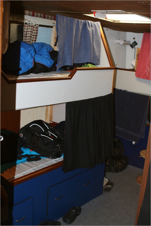 That is my rack on top and to the left. I have three roommates in this stateroom.