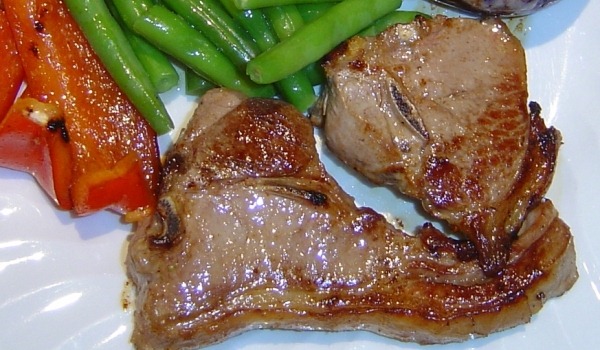 Pork chops and vegetables on a plate