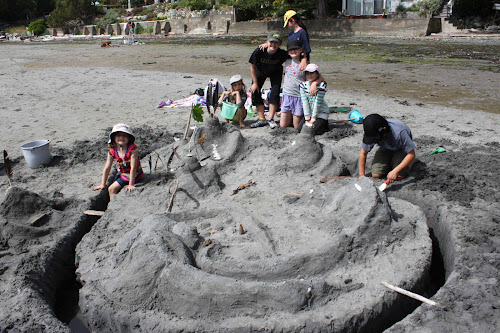 This sand castle was a whole city, surrounded by a very very deep moat. The girls were determinded diggers, that's for sure!