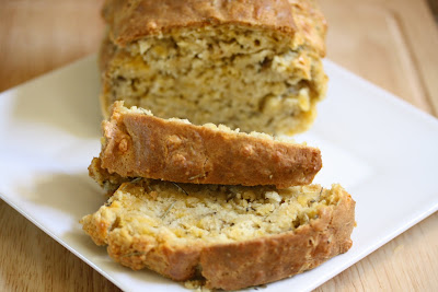 close-up photo of sliced Rosemary cheese beer bread