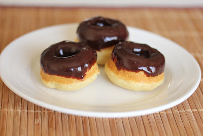 photo of three mini donuts on a plate