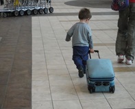 kid with suitcase