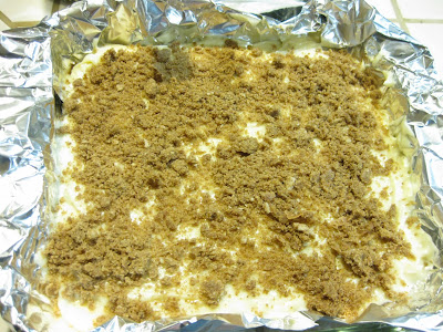 photo of the batter in a baking pan with the streusel on top