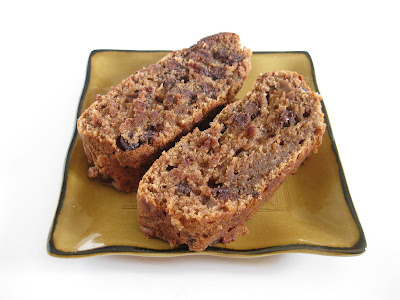 photo of two slices of chocolate banana nut bread on a plate