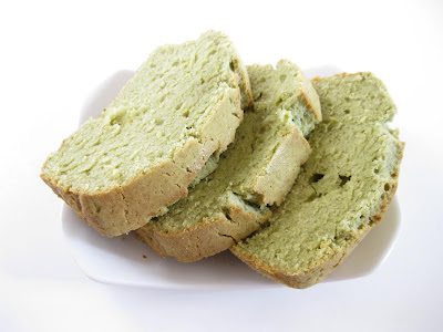 three slices of matcha pound cake on a white plate.
