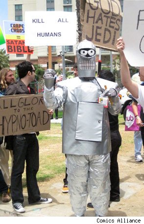 man in robot costume with KILL ALL HUMANS sign