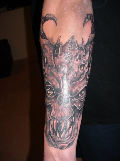 custom skull tattoos. demon skull tattoos