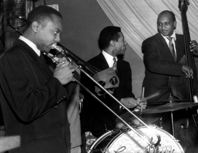 BNote_ Oscar Pettiford with Max Roach and J.J. Johnson (Photo by Marcel Fleiss).jpg