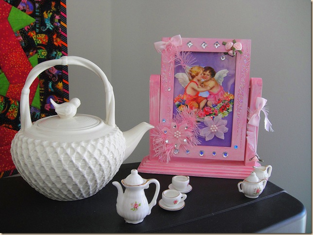 bird nest tea pot and pink frame