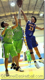 Larry Mayrina goes for the rebound against Palm Garden Cafe players.