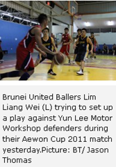 Brunei United Ballers Lim Liang Wei (L) trying to set up a play against Yun Lee Motor Workshop defenders during their Aewon Cup 2011 match yesterday.Picture: BT/ Jason Thomas 