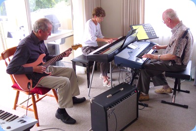 Brian Gunson (guitar), Denise Gunson (piano) and Peter Brophy on keyboard jamming
