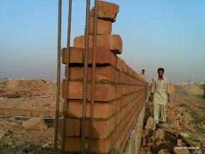 Wall construction begins