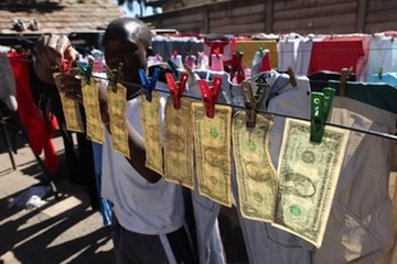 APTOPIX Zimbabwe Money Laundering