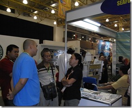 Dr. MLC Aralar (rightmost) giving consultations to guests at the AQD booth