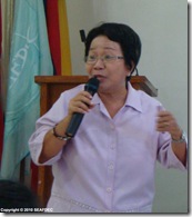 AQD socioeconomist Ms. Didi Baticados gives a lecture on livelihood and enterprise development to Aklan-Iloilo participants