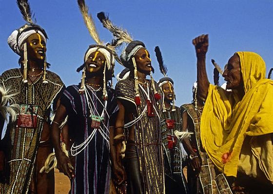 [A female judge urges Wodaabe male dancers to exaggerate their facial expressions, in Niger in 1996[4].jpg]