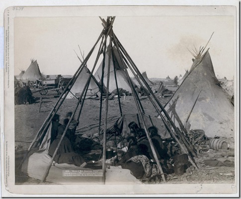 Title: "Home of Mrs. American Horse." Visiting squaws at Mrs. A's home in hostile camp
Oglala women and children seated inside an uncovered tipi frame in an encampment--most are looking away from the camera--probably on or near Pine Ridge Reservation. 1891.
Repository: Library of Congress Prints and Photographs Division Washington, D.C. 20540
