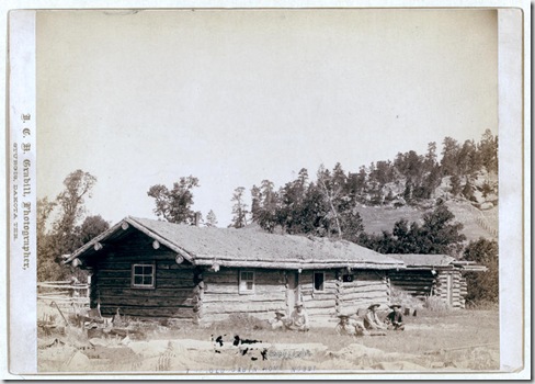 Title: The old cabin home
Five men sitting in grass, in front of log cabin. [between 1887 and 1892]
Repository: Library of Congress Prints and Photographs Division Washington, D.C. 20540