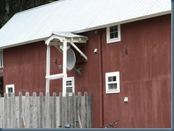 Note satellite dish pointing down; at top of the world, geosynchronous satellite is over the horizon Note satellite dish pointing down; at top of the world, geosynchronous satellite is over the horizon