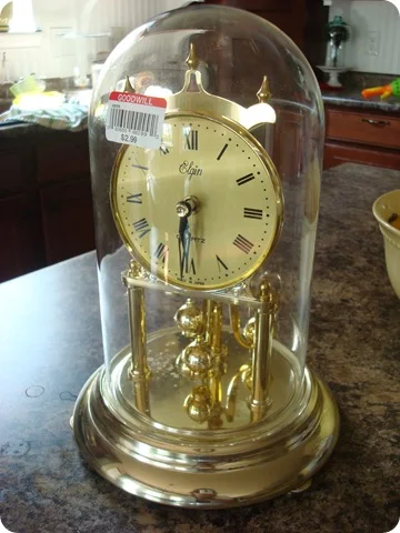 Goodwill brass clock turned into cloche