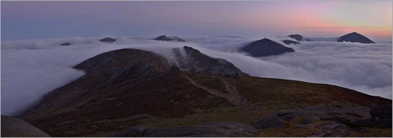 Cloud inversion sunrise over the Mournes from Slieve Binian       
