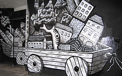 Photograph of a cart in Phlegm's piece.