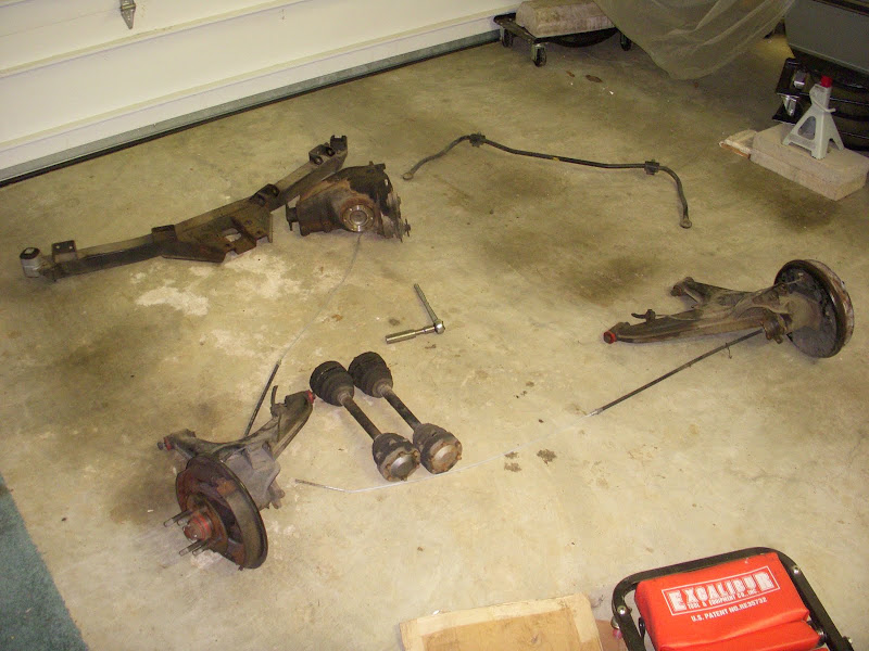 removing the rear subframe, trailing arms etc.