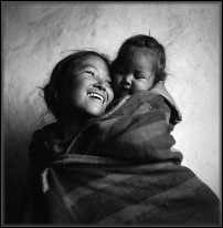 First Prize: Devon Cummings cummingsdevon@earthlink.net 495 12th st., #3R Brooklyn, NY 11215 USA 646-207-4951  Title: Madonna and Child Caption: Mother and child in Muktinath, Nepal. 