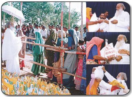 PujyaBapuji distributing grains