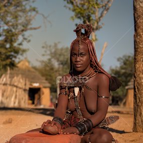 Grinding Ochre by André Norris - People Portraits of Women