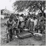 Women do their laundry on a tombstone at Sadras, Tamil Nadu, India