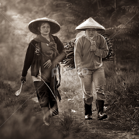 Once upon a time in village by A Friyana Wiradikarta - People Portraits of Women
