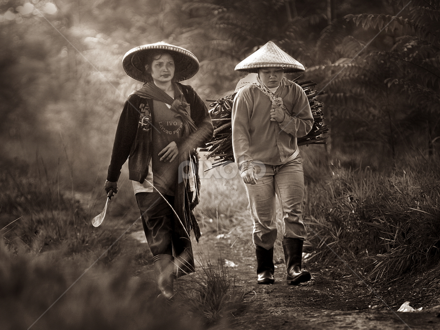 Once upon a time in village by A Friyana Wiradikarta - People Portraits of Women