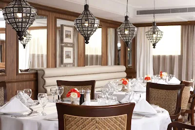 Enjoy a fine dining experience as you cruise along the Nile aboard River Tosca from Uniworld River Cruises.