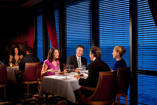 Share a quiet meal with friends at Chops Grille, the popular steakhouse on Grandeur of the Seas.