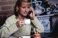 woman on cell phone drinking coffee 0001
