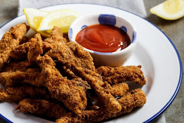 Corn flake-crusted chicken strips with honey-mustard sauce