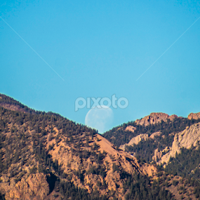 The Moon setting in the Blodgett Peak valley by Robie Blair - Landscapes Mountains & Hills