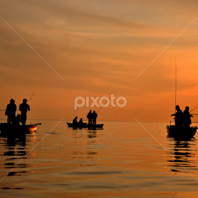 fishing on sunset by Ahmet AYDIN - People Street & Candids